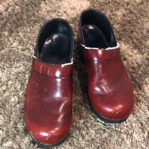 Dansko clogs signs of wear but plenty of life left.